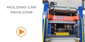 Press with heating plates for molding car pavilions
